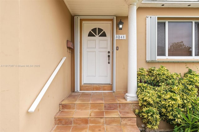3241 SW 20th St, Miami, FL 33145 - doorway to property with stucco siding
