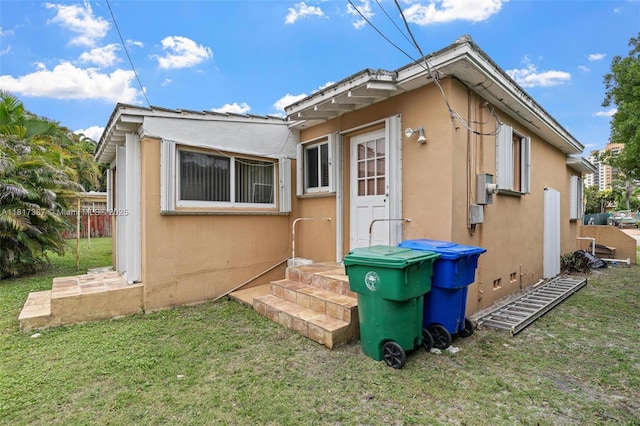 3241 SW 20th St, Miami, FL 33145 - rear view of house with stucco siding