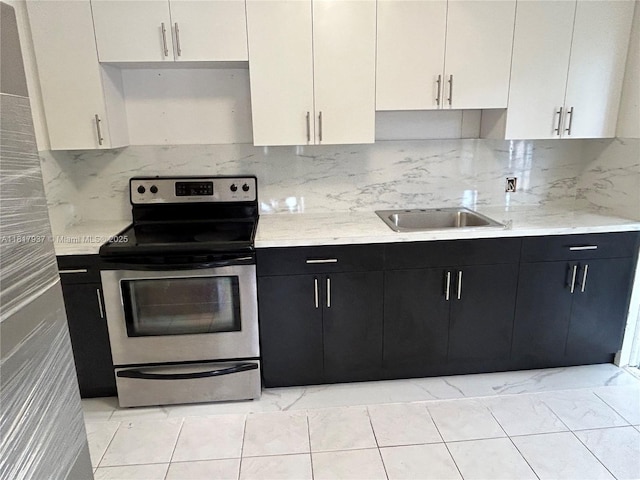 3072 SW 16th St, Miami, FL 33145 - kitchen featuring electric stove, dark cabinetry, a sink, tasteful backsplash, and white cabinets
