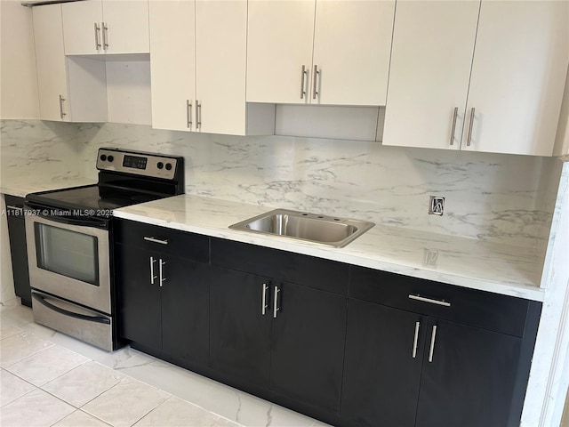 3072 SW 16th St, Miami, FL 33145 - kitchen featuring stainless steel range with electric stovetop, dark cabinets, tasteful backsplash, a sink, and white cabinetry