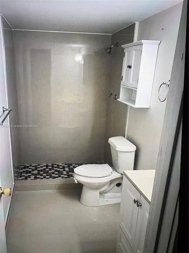 3072 SW 16th St, Miami, FL 33145 - bathroom featuring vanity, toilet, and a tile shower