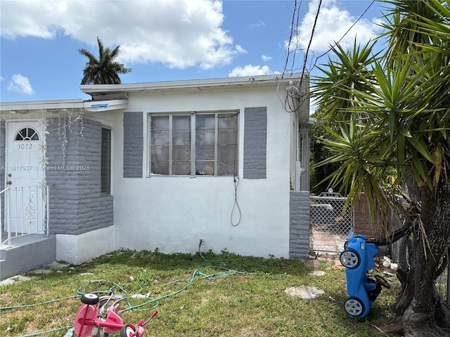 3072 SW 16th St, Miami, FL 33145 - view of home's exterior featuring stucco siding