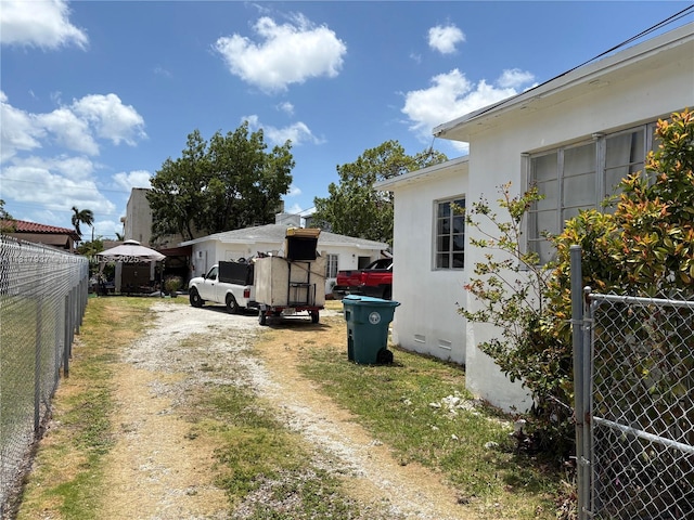 3072 SW 16th St, Miami, FL 33145 - view of dirt / gravel driveway