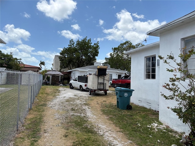 3072 SW 16th St, Miami, FL 33145 - view of parking featuring dirt driveway
