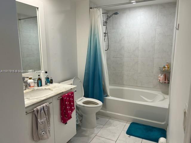 950 Brickell Bay Dr Unit 1608, Miami, FL 33131 - full bath with vanity, marble finish floors, and shower / bath combination with curtain