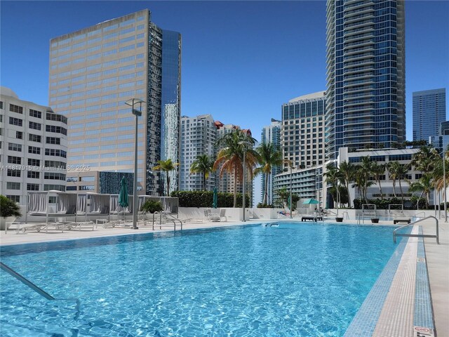 950 Brickell Bay Dr Unit 1608, Miami, FL 33131 - community pool with a city view