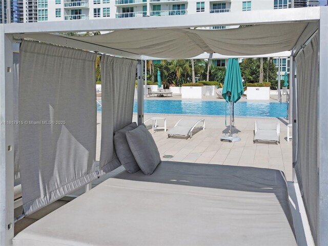 950 Brickell Bay Dr Unit 1608, Miami, FL 33131 - community pool featuring a patio