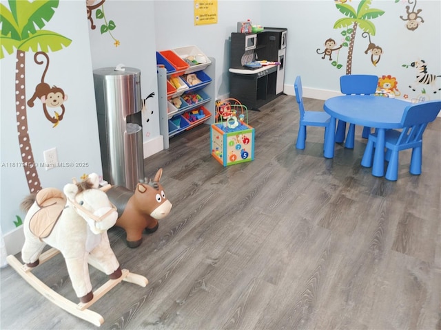 950 Brickell Bay Dr Unit 1608, Miami, FL 33131 - recreation room with wood finished floors and baseboards