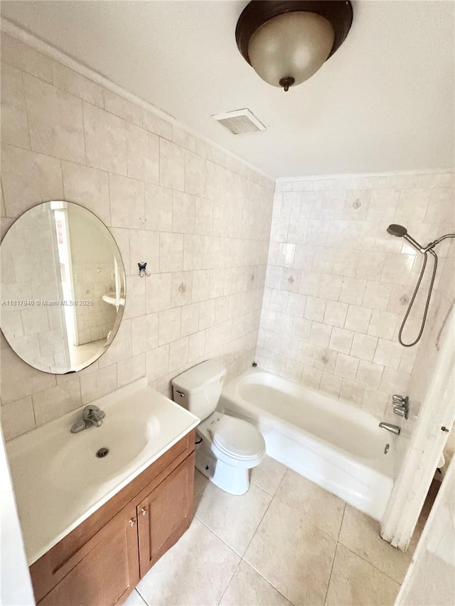 6121 W 24th Ave Unit 204, Hialeah, FL 33016 - bathroom with tile walls, vanity, toilet, tile patterned floors, and shower / washtub combination