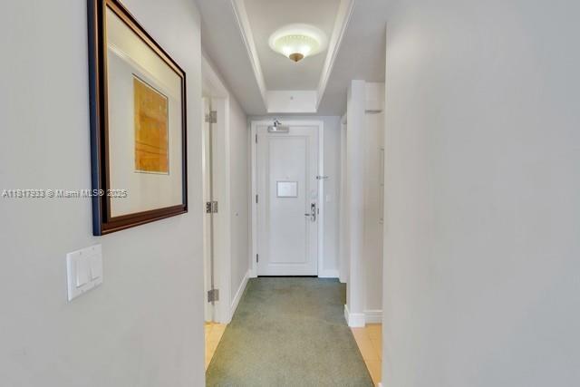 1435 Brickell Ave Unit 3011, Miami, FL 33131 - hall with baseboards and light carpet