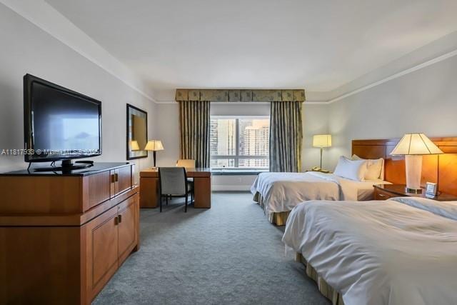 1435 Brickell Ave Unit 3011, Miami, FL 33131 - carpeted bedroom with ornamental molding