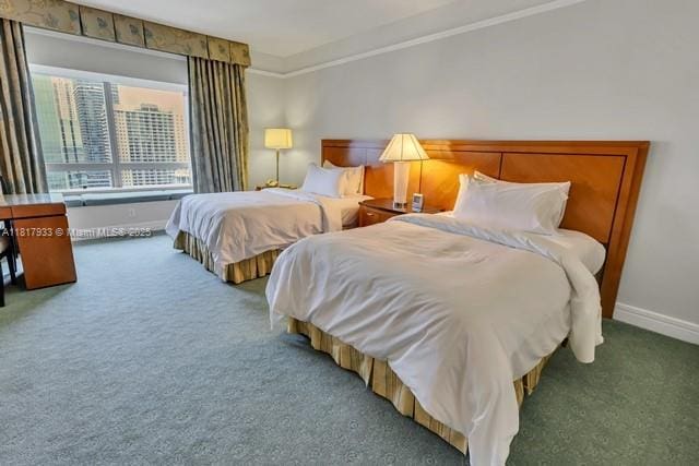 1435 Brickell Ave Unit 3011, Miami, FL 33131 - carpeted bedroom featuring baseboards and ornamental molding