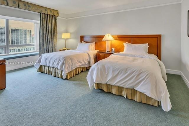 1435 Brickell Ave Unit 3011, Miami, FL 33131 - carpeted bedroom featuring baseboards and ornamental molding
