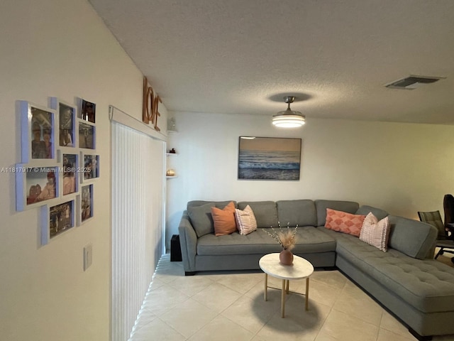 10803 Cypress Glen Dr Unit 10803, Coral Springs, FL 33071 - living room featuring light tile patterned floors and a textured ceiling