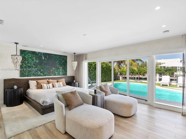 2371 Bayview Ln, North Miami, FL 33181 - bedroom featuring access to exterior, recessed lighting, and light wood-style floors