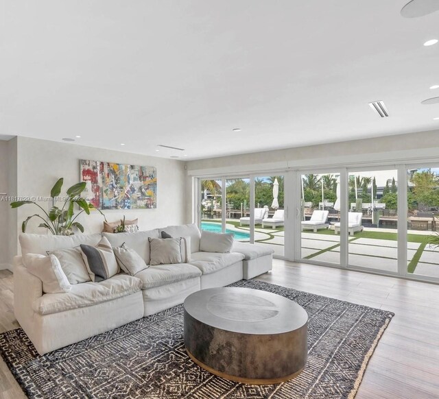 2371 Bayview Ln, North Miami, FL 33181 - living area featuring recessed lighting and wood finished floors