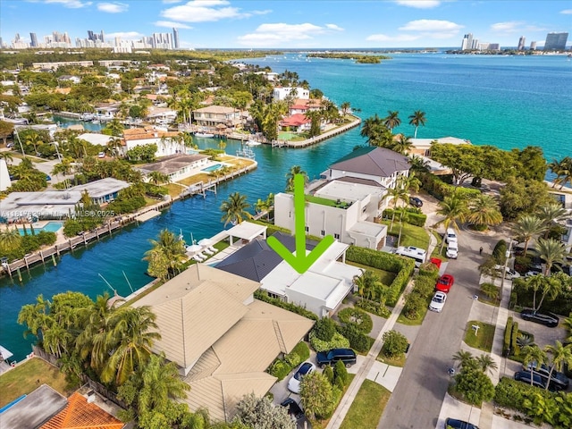 2371 Bayview Ln, North Miami, FL 33181 - aerial view of residential area with a nearby body of water and city skyline
