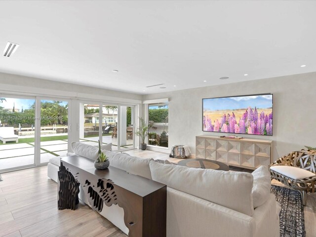 2371 Bayview Ln, North Miami, FL 33181 - living area featuring light wood-style floors and recessed lighting