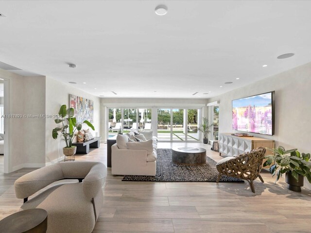 2371 Bayview Ln, North Miami, FL 33181 - living room with wood finished floors and recessed lighting