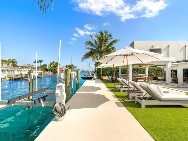 2371 Bayview Ln, North Miami, FL 33181 - dock area with boat lift and a water view