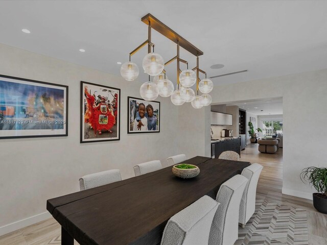 2371 Bayview Ln, North Miami, FL 33181 - dining space featuring light wood-style flooring, baseboards, and recessed lighting