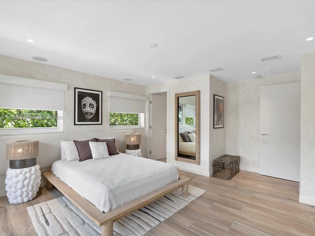 2371 Bayview Ln, North Miami, FL 33181 - bedroom featuring light wood finished floors, recessed lighting, and baseboards