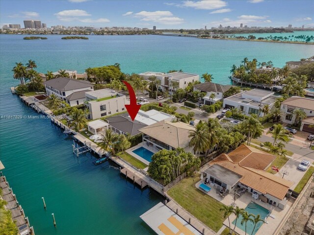 2371 Bayview Ln, North Miami, FL 33181 - aerial view of residential area featuring a nearby body of water and skyline