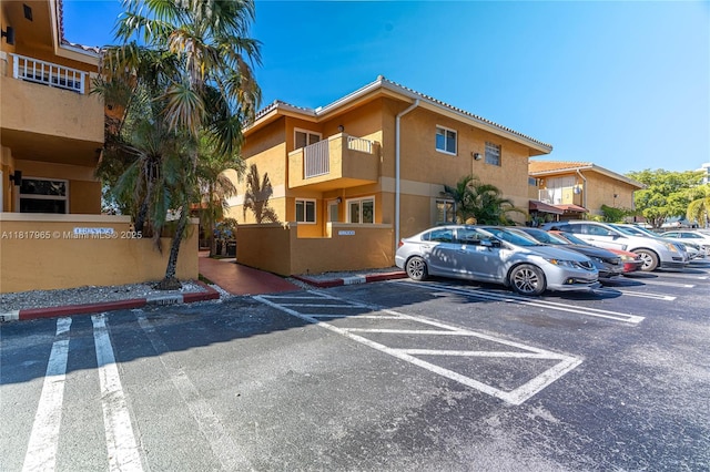 13900 SW 65th Ter Unit 9, Miami, FL 33183 - view of building exterior with uncovered parking