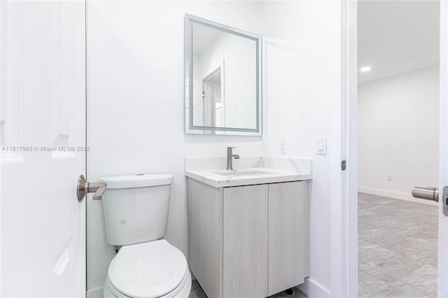 13900 SW 65th Ter Unit 9, Miami, FL 33183 - bathroom featuring vanity, toilet, and baseboards