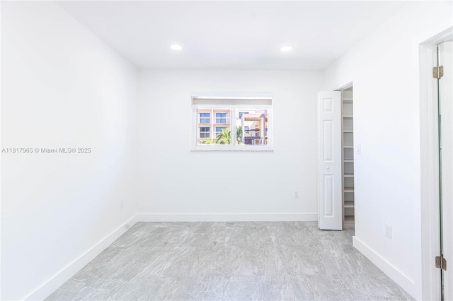 13900 SW 65th Ter Unit 9, Miami, FL 33183 - unfurnished bedroom featuring a spacious closet, baseboards, recessed lighting, and a closet