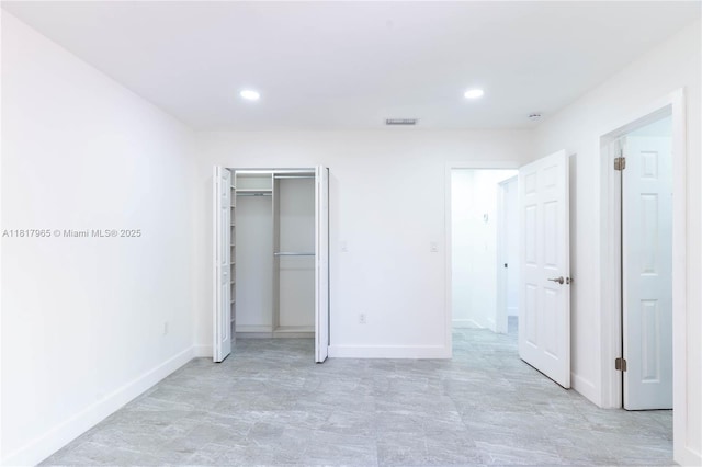 13900 SW 65th Ter Unit 9, Miami, FL 33183 - unfurnished bedroom featuring baseboards, recessed lighting, and a closet