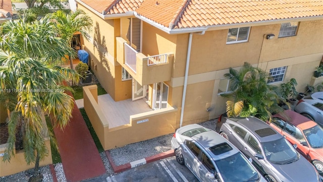 13900 SW 65th Ter Unit 9, Miami, FL 33183 - view of building exterior featuring uncovered parking