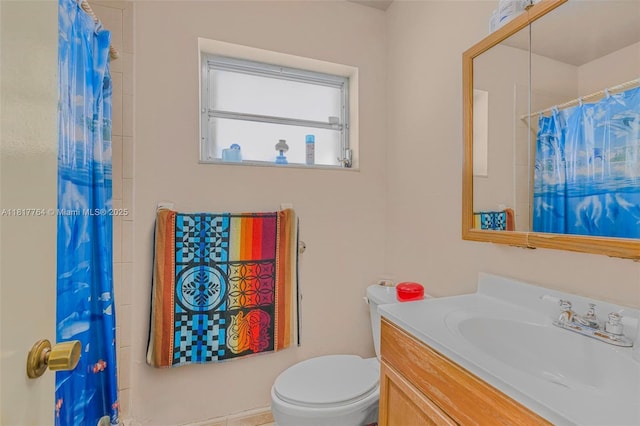 10845 SW 26th Ter, Miami, FL 33165 - bathroom featuring toilet, vanity, and a shower with curtain