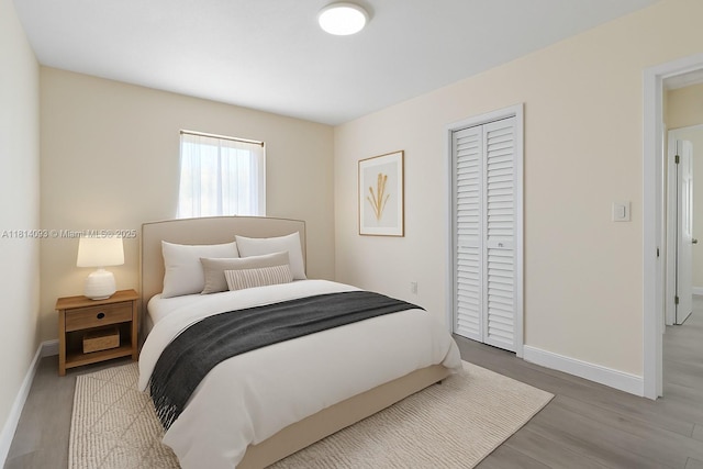 6221 NW 37th Ter, Virginia Gardens, FL 33166 - bedroom with wood finished floors and a closet