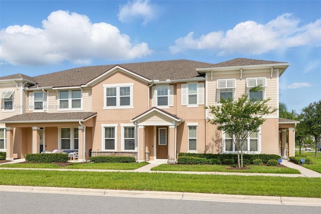2200 Garden Belle Dr, Clermont, FL 34711 - multi unit property with a front lawn and stucco siding