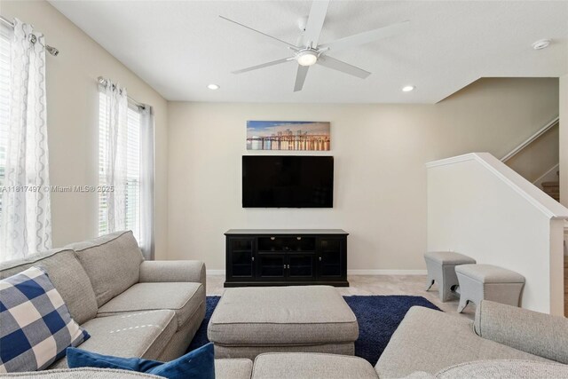 2200 Garden Belle Dr, Clermont, FL 34711 - living area with ceiling fan, recessed lighting, baseboards, stairway, and carpet flooring