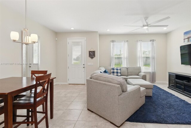2200 Garden Belle Dr, Clermont, FL 34711 - living area with a ceiling fan, a chandelier, recessed lighting, light tile patterned floors, and baseboards