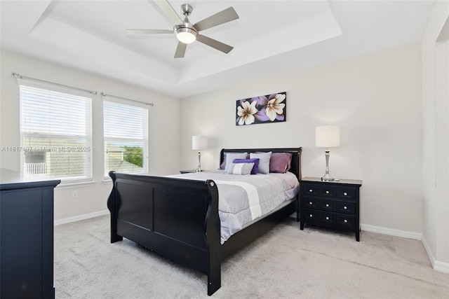 2200 Garden Belle Dr, Clermont, FL 34711 - bedroom featuring a tray ceiling, carpet, baseboards, and a ceiling fan