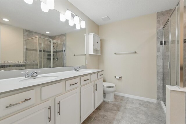 2200 Garden Belle Dr, Clermont, FL 34711 - full bathroom with a shower stall, double vanity, toilet, and baseboards