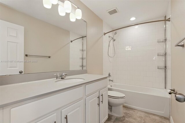 2200 Garden Belle Dr, Clermont, FL 34711 - bathroom with toilet, vanity, shower / bath combination, tile patterned flooring, and recessed lighting