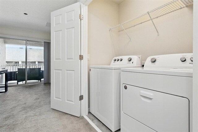 2200 Garden Belle Dr, Clermont, FL 34711 - washroom featuring independent washer and dryer and light colored carpet