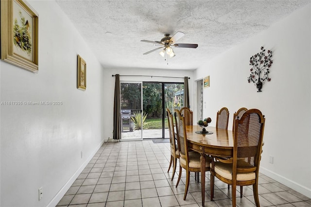 4459 NW 113th Ln, Coral Springs, FL 33065 - dining space featuring a ceiling fan, light tile patterned flooring, a textured ceiling, and baseboards