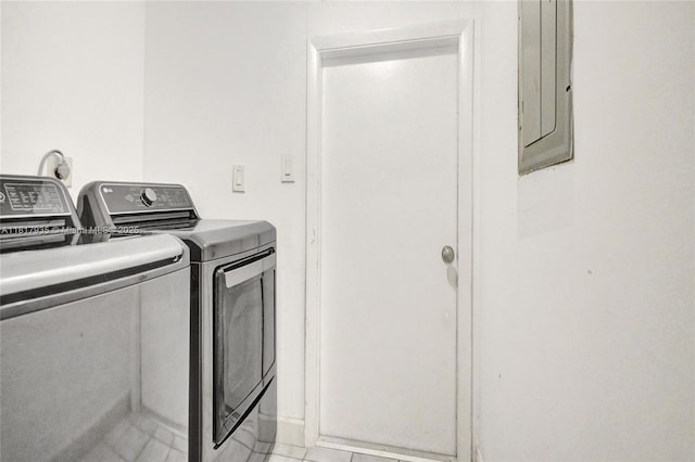 4459 NW 113th Ln, Coral Springs, FL 33065 - laundry area with washing machine and clothes dryer and electric panel