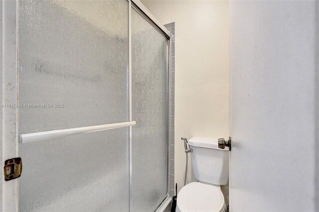 4459 NW 113th Ln, Coral Springs, FL 33065 - bathroom with toilet and a stall shower