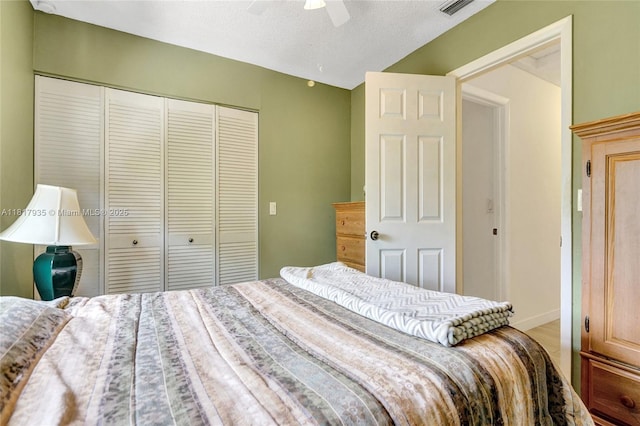 4459 NW 113th Ln, Coral Springs, FL 33065 - bedroom with a closet and a ceiling fan