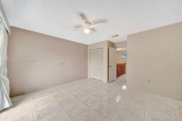1615 N 14th Ter, Hollywood, FL 33020 - unfurnished room with ceiling fan and a textured ceiling
