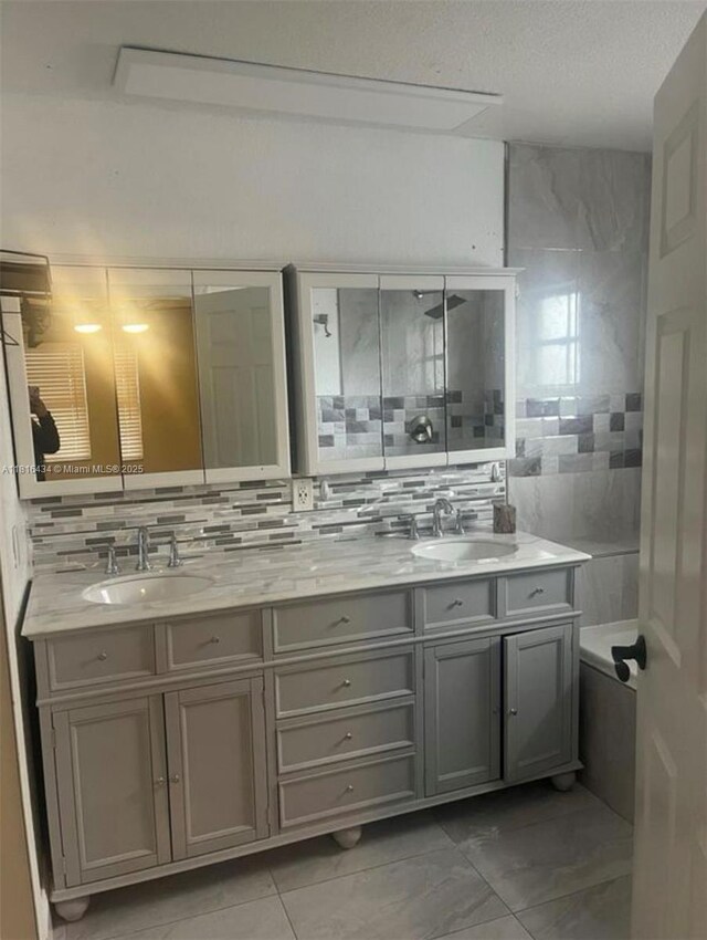 14880 SW 56th Ter, Miami, FL 33193 - bathroom with double vanity, tasteful backsplash, and a shower