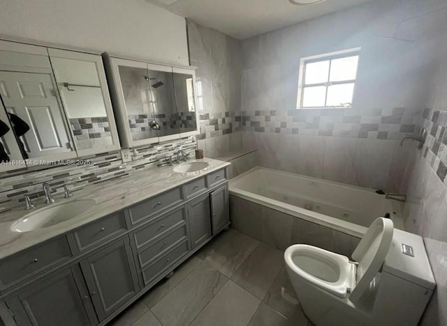 14880 SW 56th Ter, Miami, FL 33193 - full bath featuring a whirlpool tub, double vanity, tile walls, tiled shower, and toilet