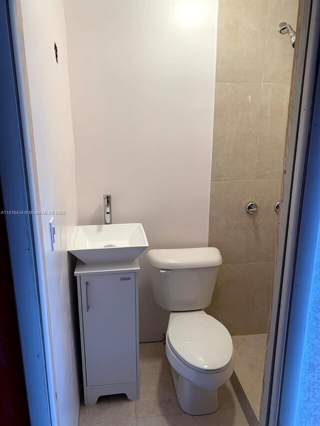 14880 SW 56th Ter, Miami, FL 33193 - bathroom with vanity, toilet, and tile patterned floors