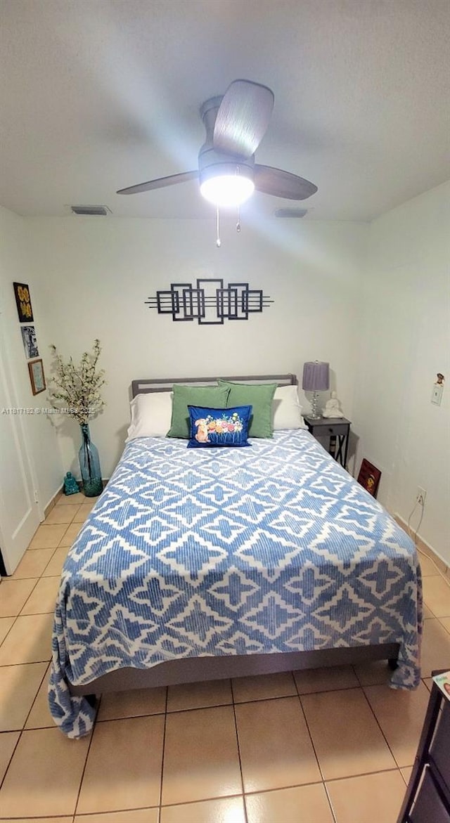 200 W 53rd Ter, Hialeah, FL 33012 - bedroom with tile patterned floors and ceiling fan